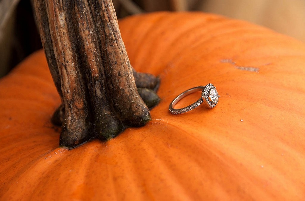 Engagement ring on pumpkin blue mountain village photographer collingwood photographer blue mountain engagement fall