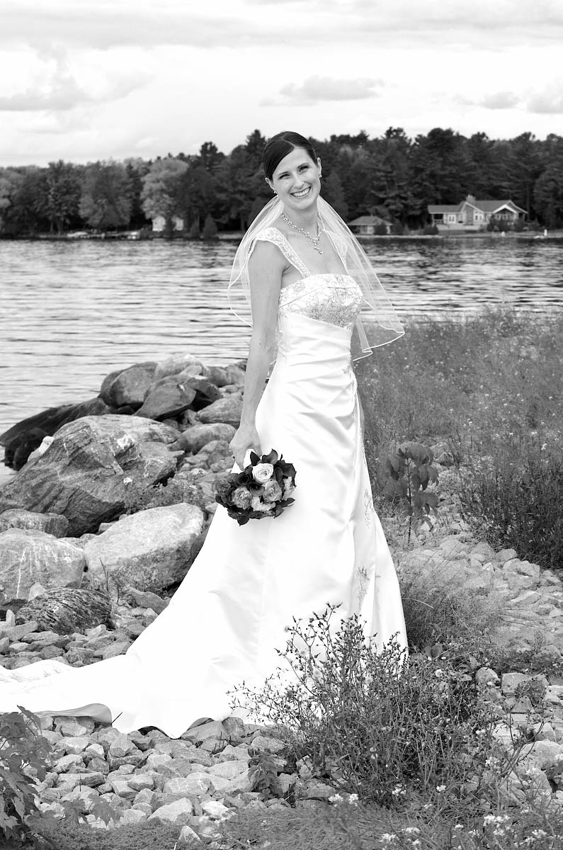 Beautiful bride by Sturgeon Lake at Eganridge wedding