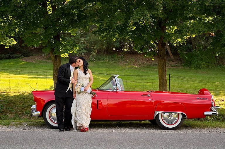 wedding couple with vintage car at caledon wedding at royal ambassador