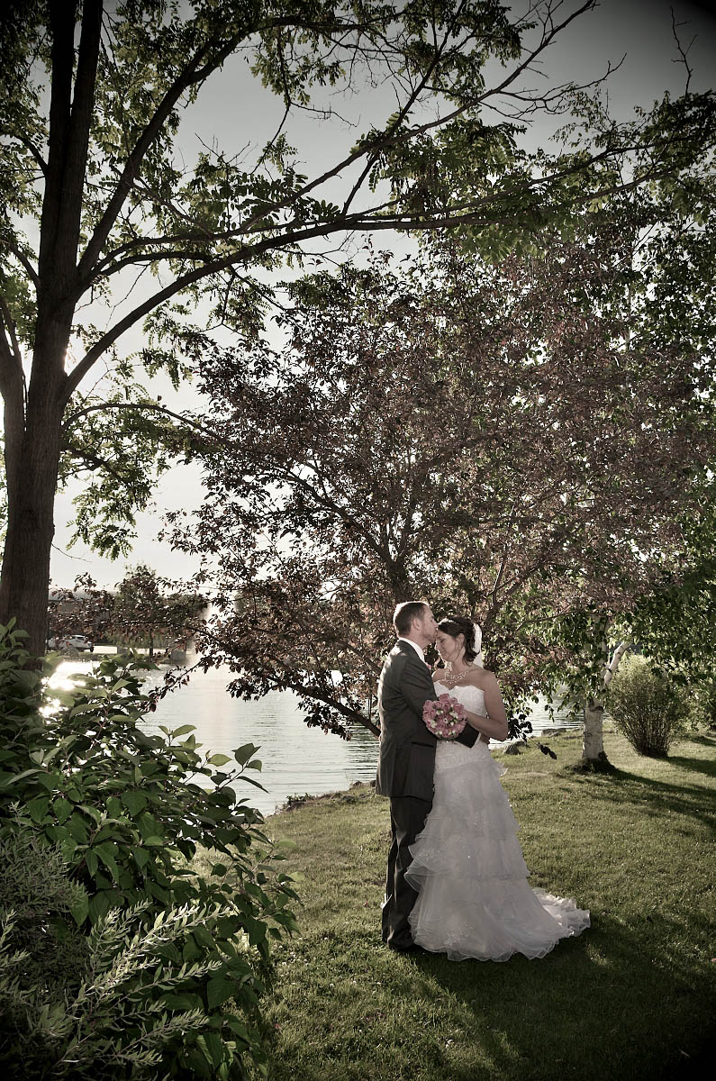 bride and groom by lake nottawasaga