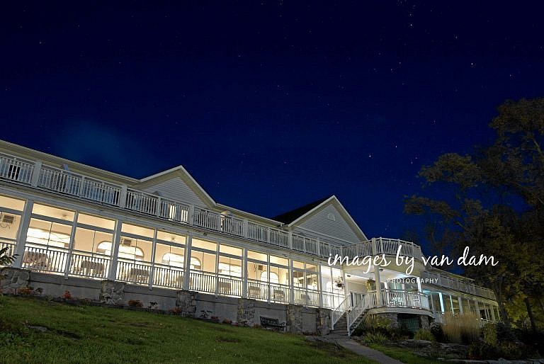 Viamede Resort wedding: hotel lit up by light with stars shining above