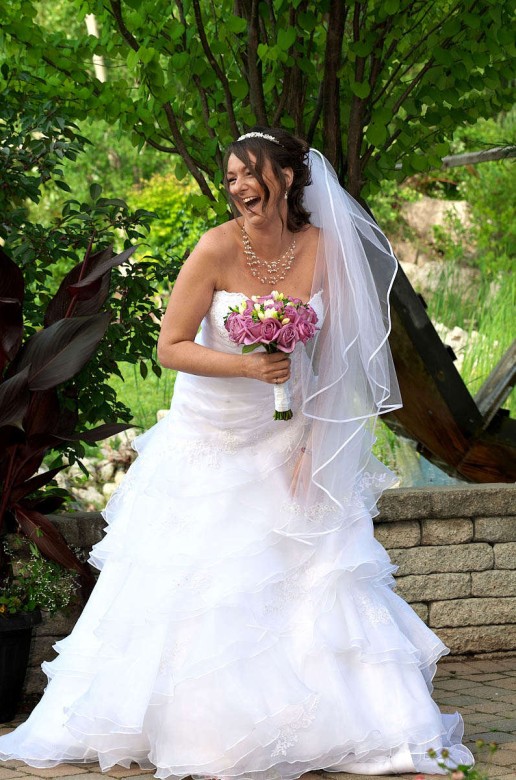 bride laughing nottawasaga wedding garden