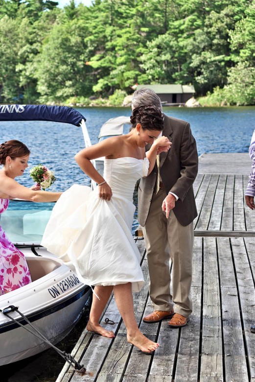 bride gets out of boat