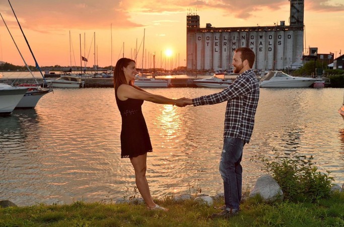 barrie photographer collingwood engagement session at sunset at Harbourlands Park with epic sunset