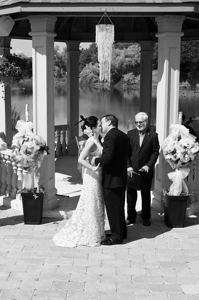 the wedding kiss at royal ambassador wedding ceremony