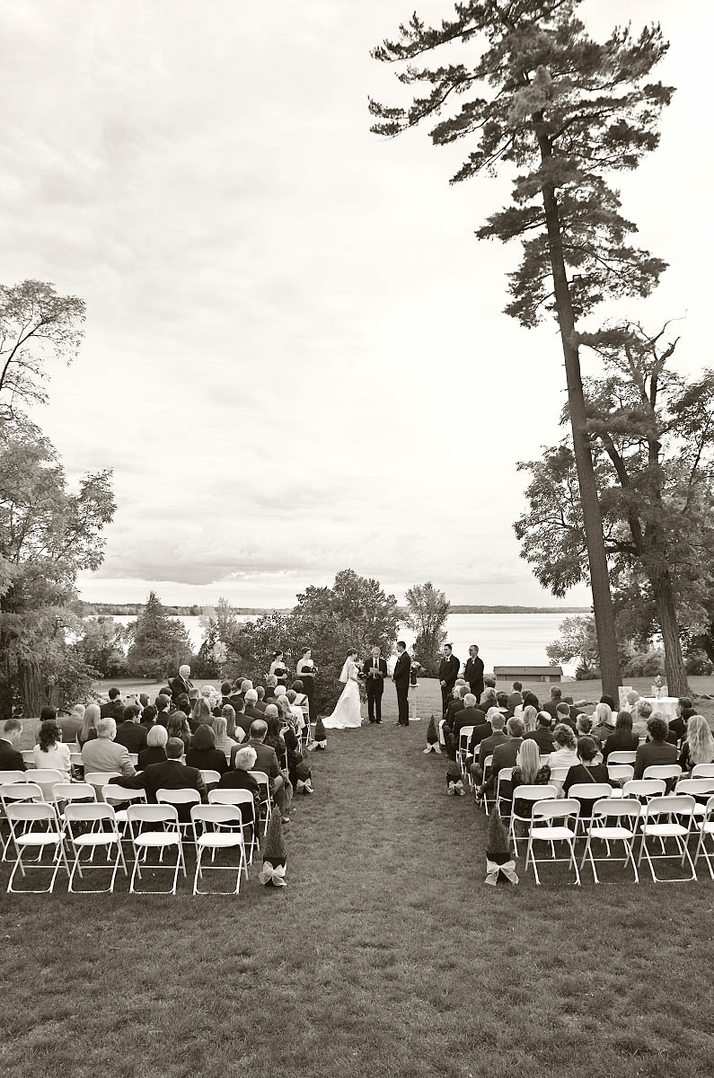 Summer wedding ceremony at The Dunsford House at Eganridge Resort overlooking Sturgeon Lake