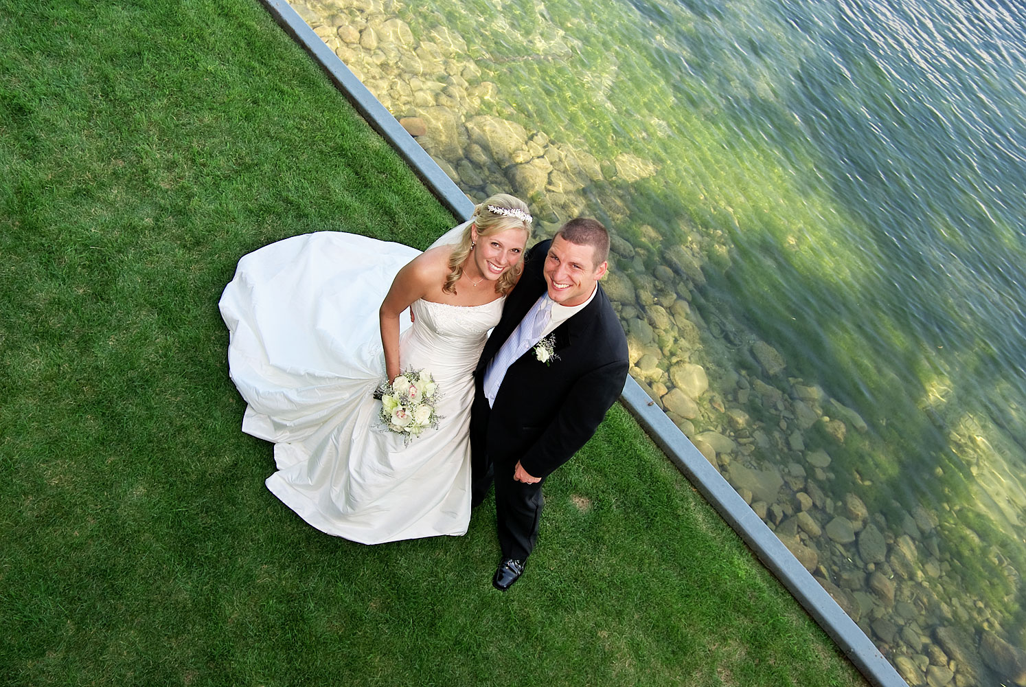 barrie photographer Bride and Groom by Lake Simcoe at Barrie wedding