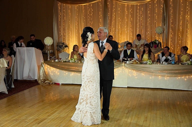 Bride dances with her father at Royal Ambassador wedding reception