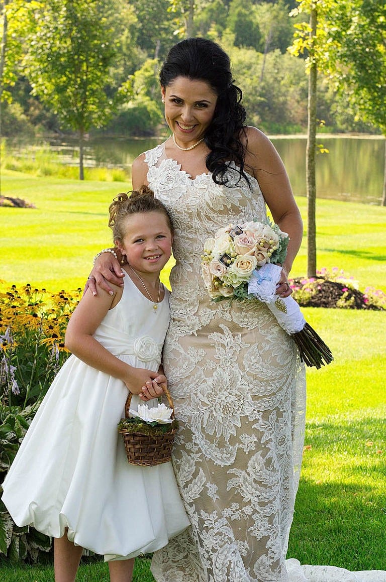 Bride with flower girl at Caledon Wedding at Royal Ambassador