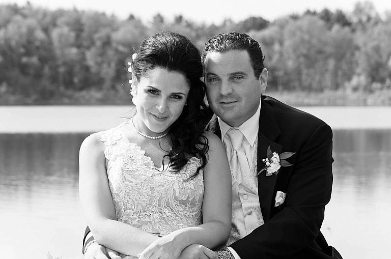 wedding couple in front of pond at Royal Ambassador in Caledon, Ontario