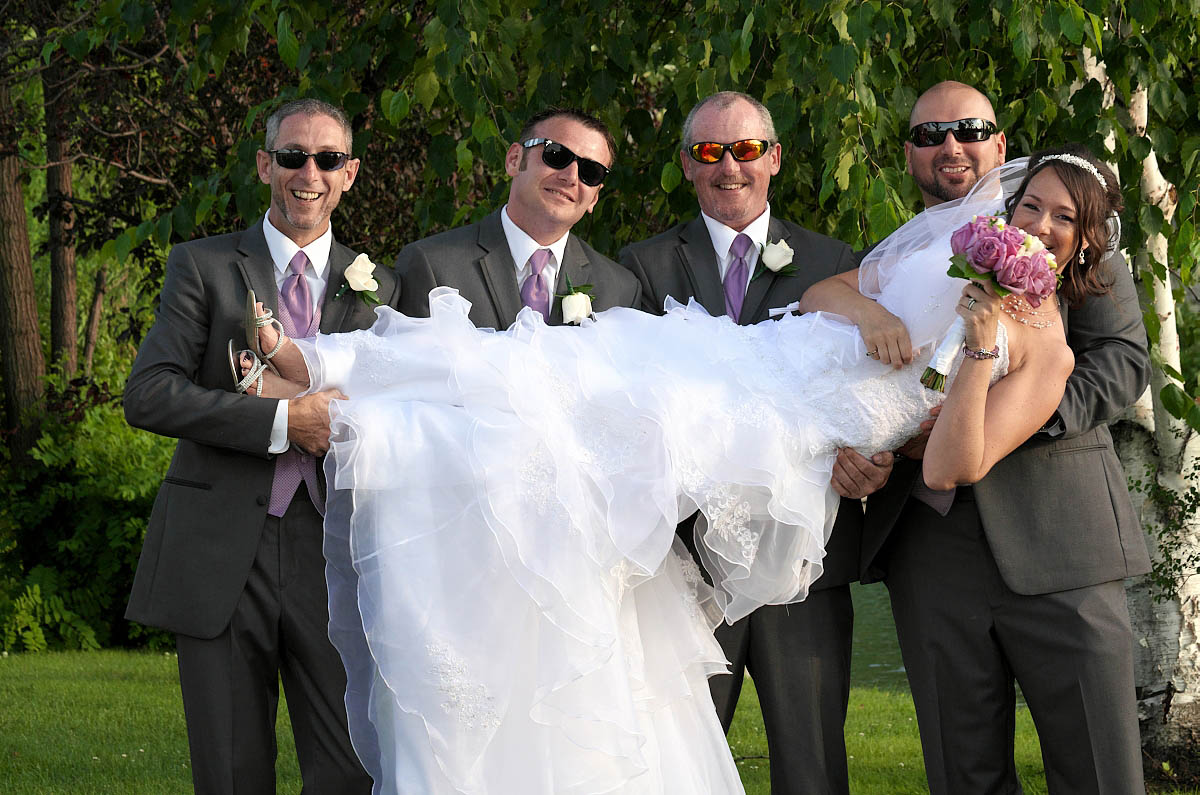 groomsmen lift bride nottawasaga