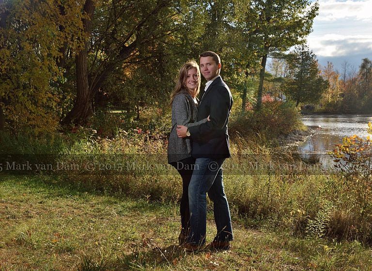 Young couple hugs by shoreline at Stephen Leacock Museum in Orillia