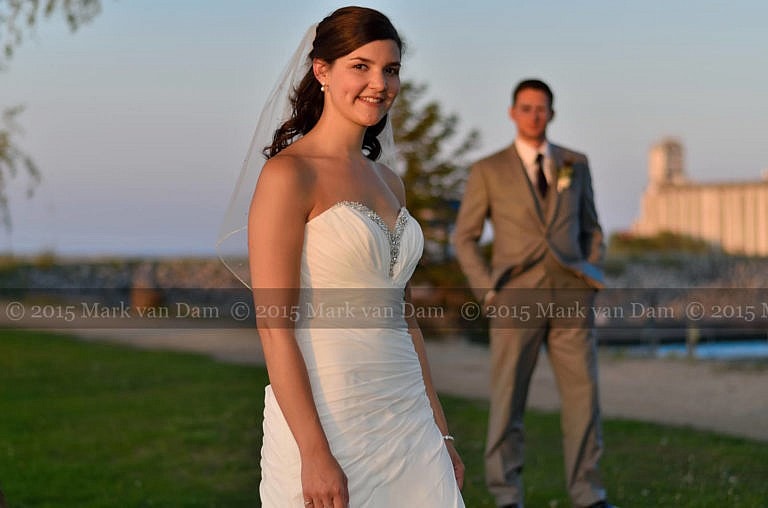 Collingwood photographer, wedding couple by the water at sunset at Cranberry Resort Bear Estate Living Waters wedding