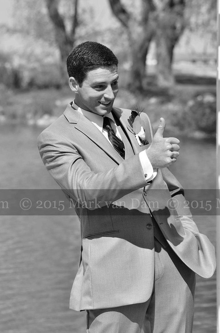 collingwood photographer, groom gives a thumbs up while waiting for his beautiful bride at Cranberry Resort Bear Estate Living Waters wedding