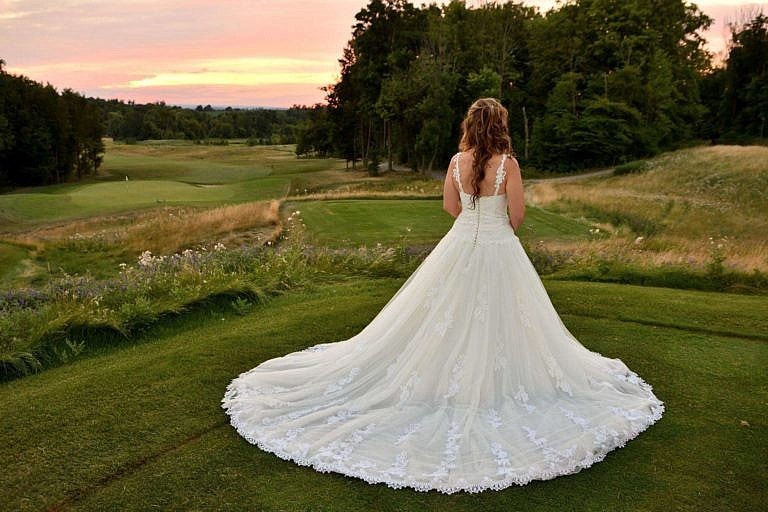 Bride's train on golf course at Club at Bond Head wedding