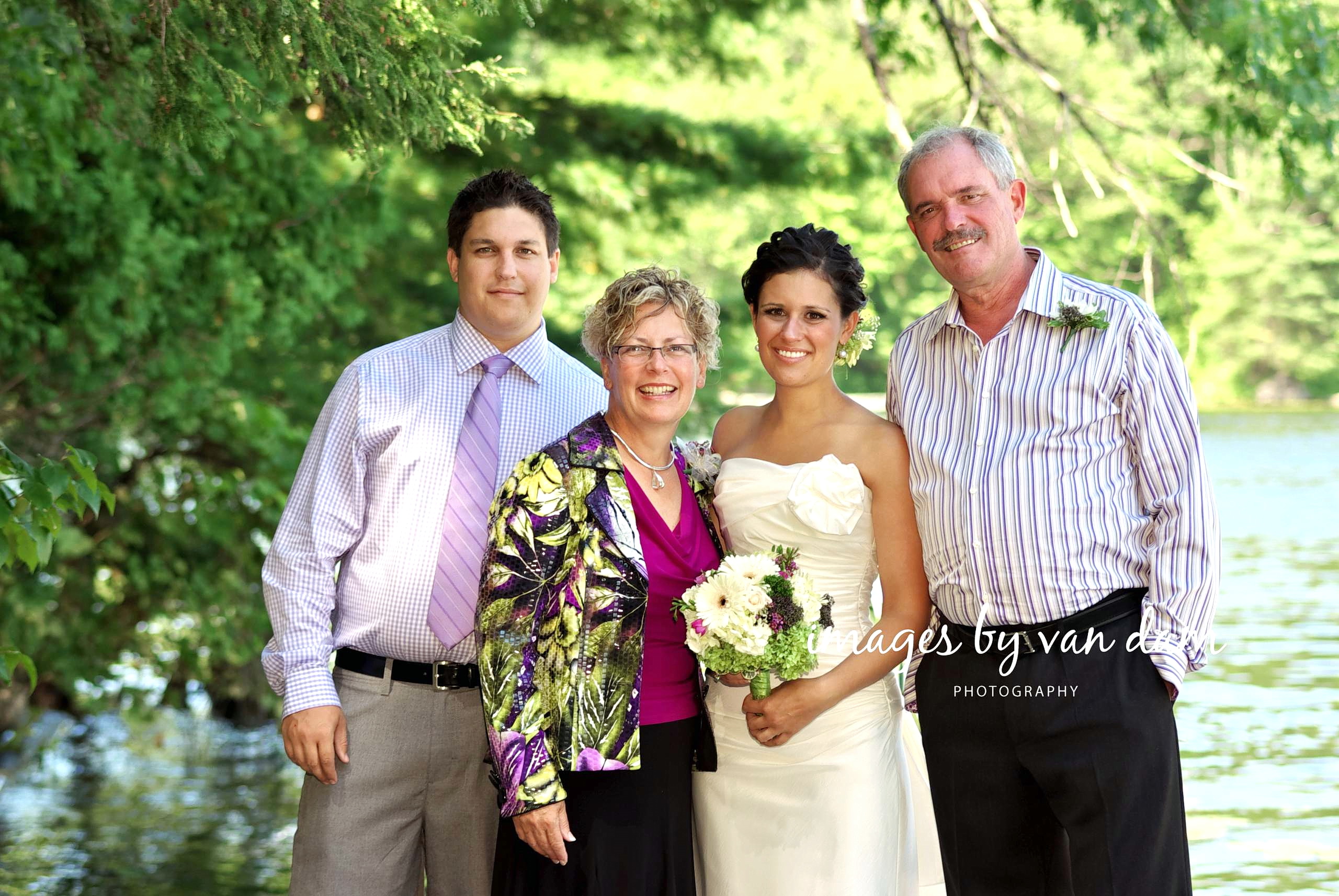 Family wedding photography on dock at Stoney Lake wedding