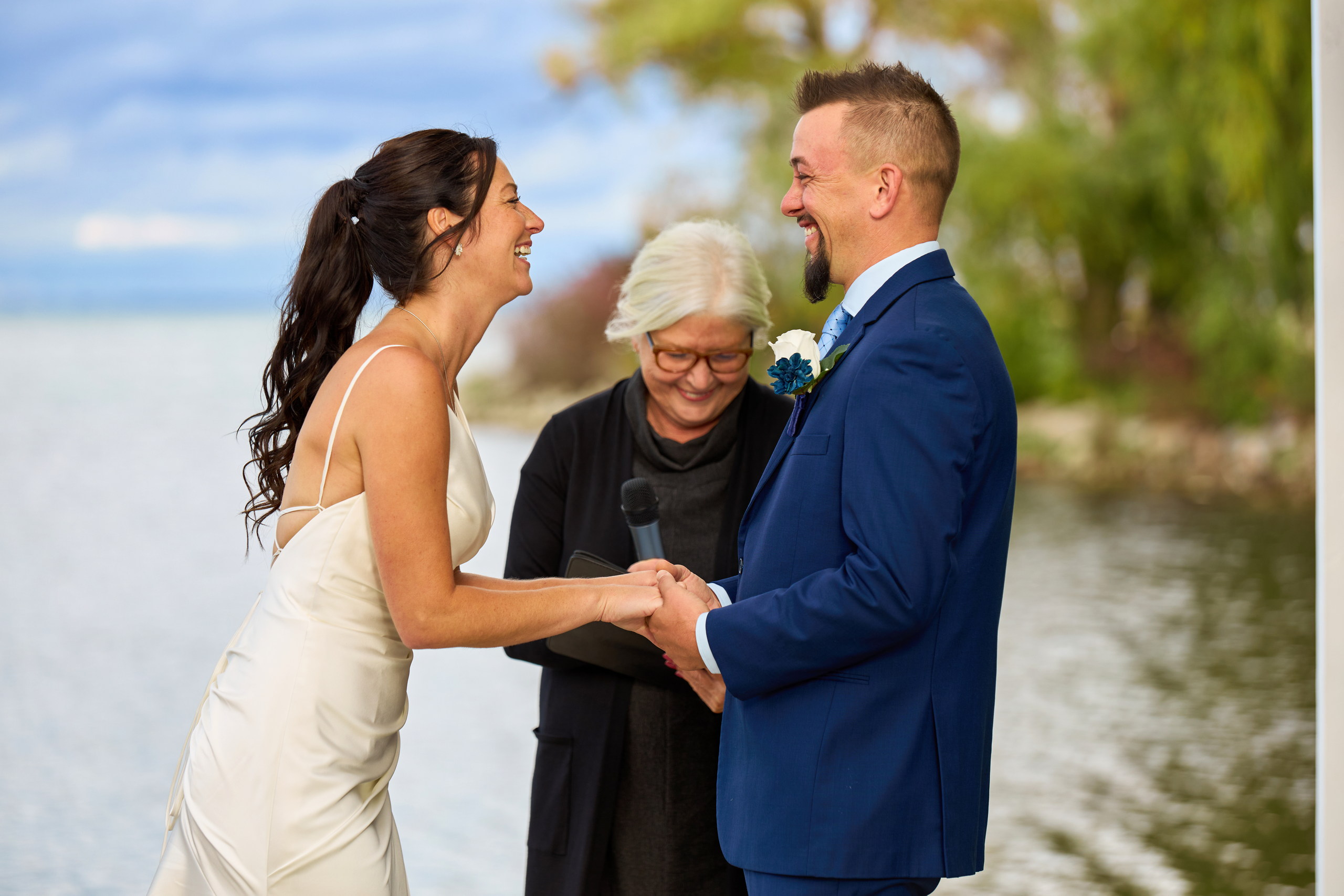 Bride and Groom Share a moment of laughter during a Bear Estate Wedding at Cranberry Resort in Collingwood